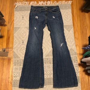 Dark blue denim destroyed bell bottom jeans